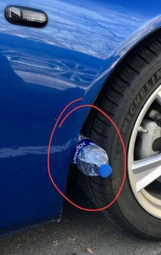 If you see a plastic bottle on your tire, pay close attention.